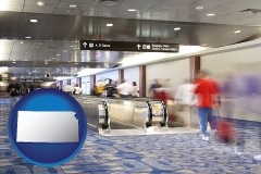 kansas map icon and an airport people mover, with motion blur