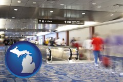 michigan map icon and an airport people mover, with motion blur