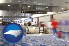 north-carolina map icon and an airport people mover, with motion blur