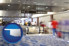 oklahoma map icon and an airport people mover, with motion blur